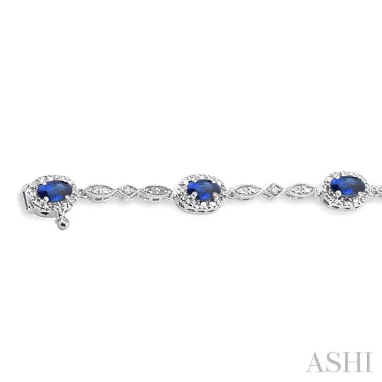 5x3 MM Oval Cut Sapphire and 1/20 Ctw Single Cut Diamond Bracelet in 10K White Gold