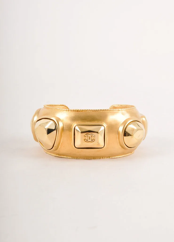 Gold Toned Chunky Studded "CC" Logo Metal Cuff Bracelet